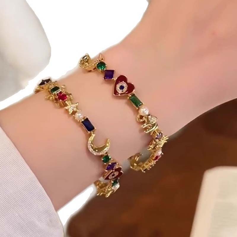 💫 LIMITED-TIME 50% RABATT + 2 kaufen 1 gratis! ✨ Himmelscharme-Armband – Sonne, Mond, Sterne, Kristalle, Goldton 🪐
