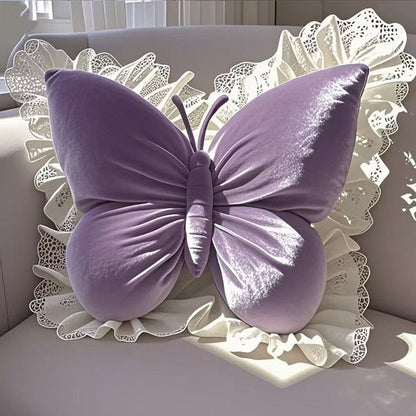 Elegantes Zierkissen in Schmetterlingsform mit Spitzenborte